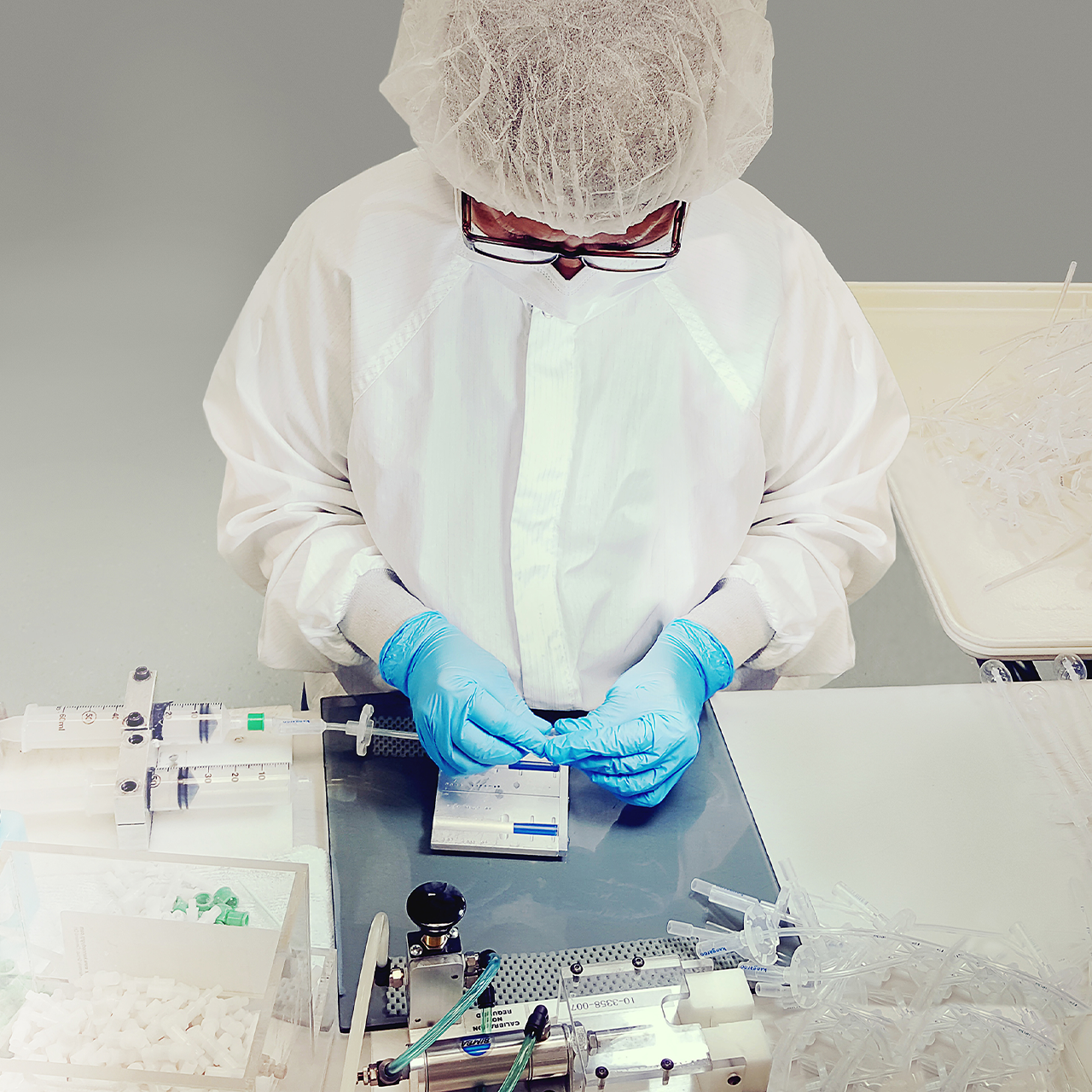 A Xeridiem technician working with silicone components